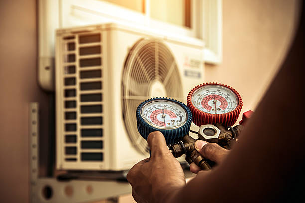Professional Air Conditioning Service technician working in Silverton, OH